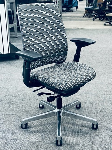 Pre-owned Steelcase Amia task chair in a patterned grey with ergonomic features